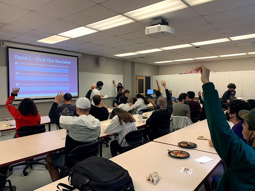 Undergrad engineering students getting their scores at TCNJ IEEE’s Resistor Relay 2021.